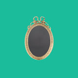 Sissi oval brass frame with decorations and ribbon