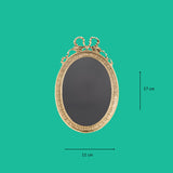 Sissi oval brass frame with decorations and ribbon