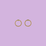 KiaraLN's Large brass Ring-shaped Earrings, a perfect blend of elegance and style. Handcrafted with meticulous attention to detail, these brass earrings exude timeless charm and artistic flair.