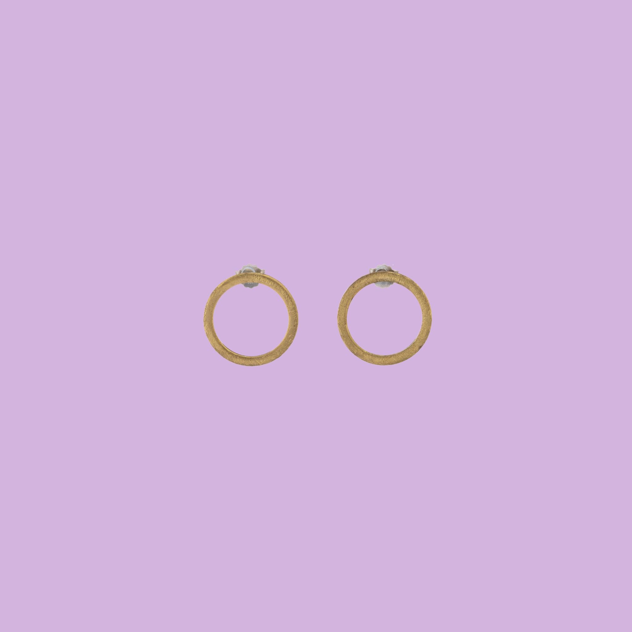 KiaraLN's Large brass Ring-shaped Earrings, a perfect blend of elegance and style. Handcrafted with meticulous attention to detail, these brass earrings exude timeless charm and artistic flair.