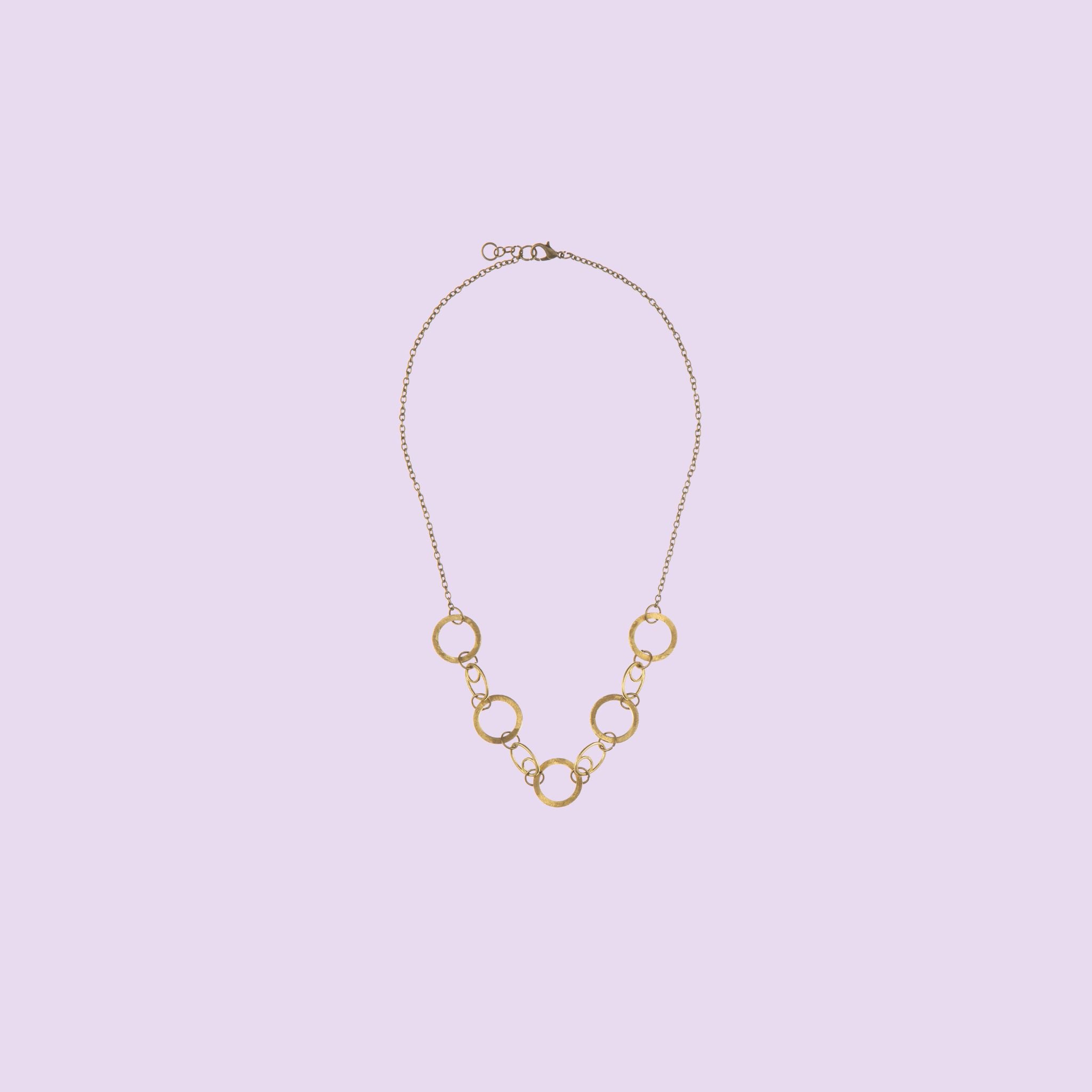 Handmade by KiaraLN, this wide brass necklace offers a chic and timeless style.