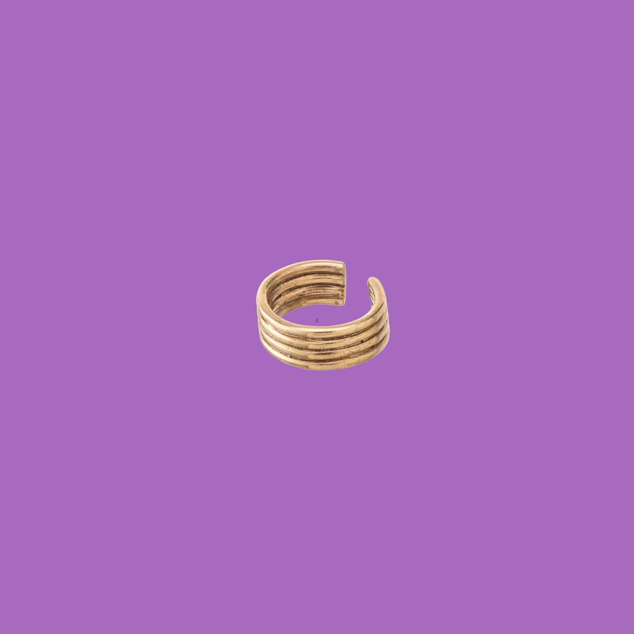 Adorn your fingers with the exquisite Tubes Brass Rings by KiaraLN. These stunning rings feature bands of brass, handcrafted to perfection