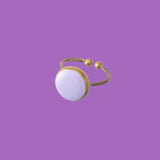 Made from high-quality brass, this rings feature a refined violet enameled round application