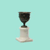 Hercules black wax brass cup with white marble