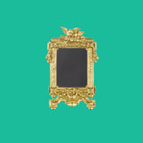 Sissi brass frame with doves and garlands