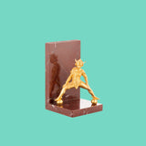 Red marble bookend with brass jester