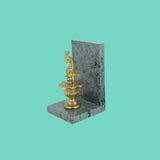 Green marble bookend with brass dolphin