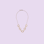 Handmade by KiaraLN, this wide brass necklace offers a chic and timeless style. 