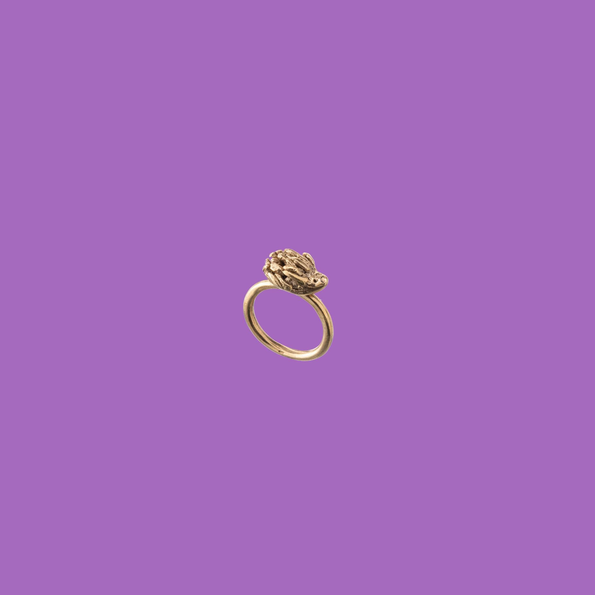 Handmade by KiaraLN, this brass hedgehog ring combines whimsy and elegance